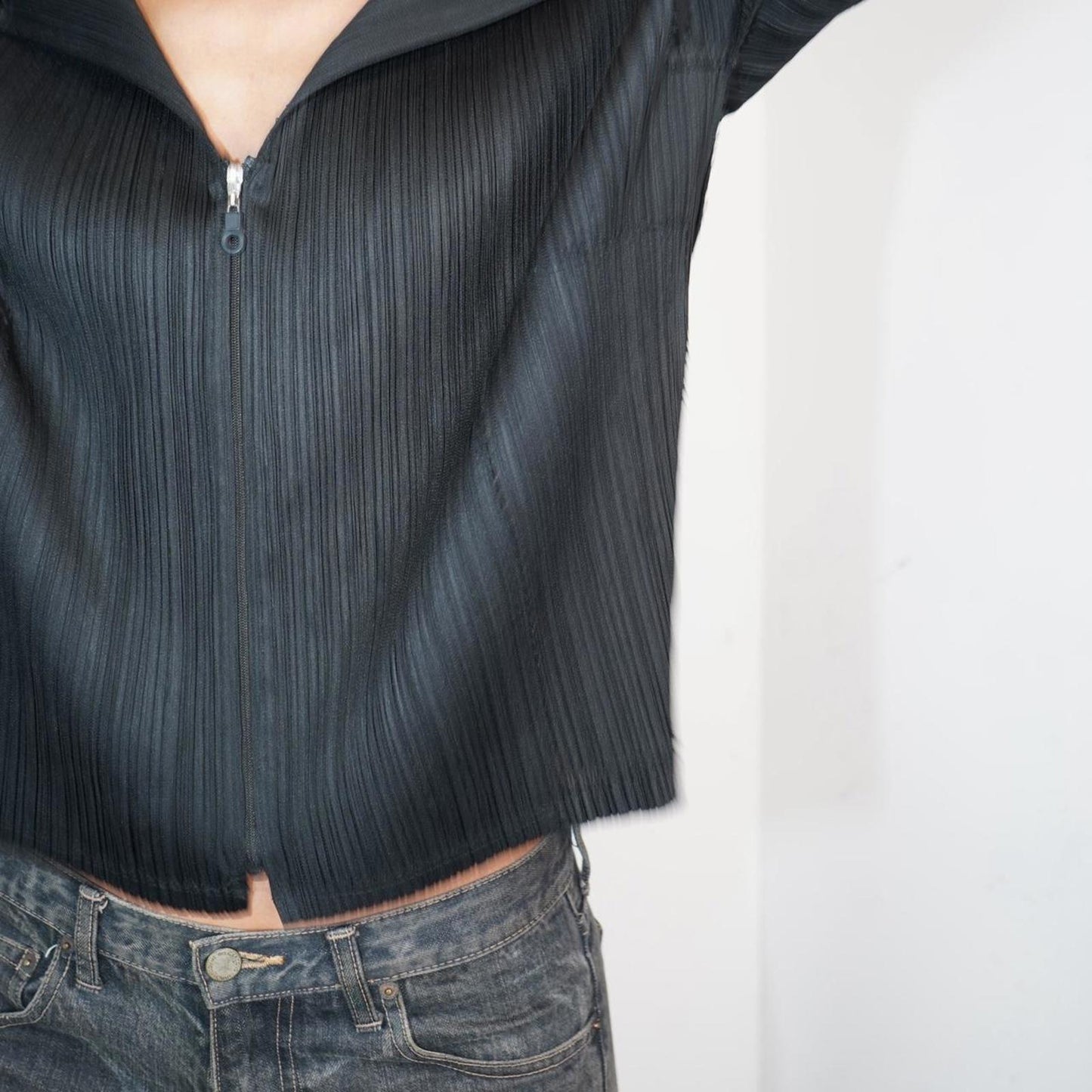 Black asymmetrical Issey Miyake Pleats Please zip up jacket