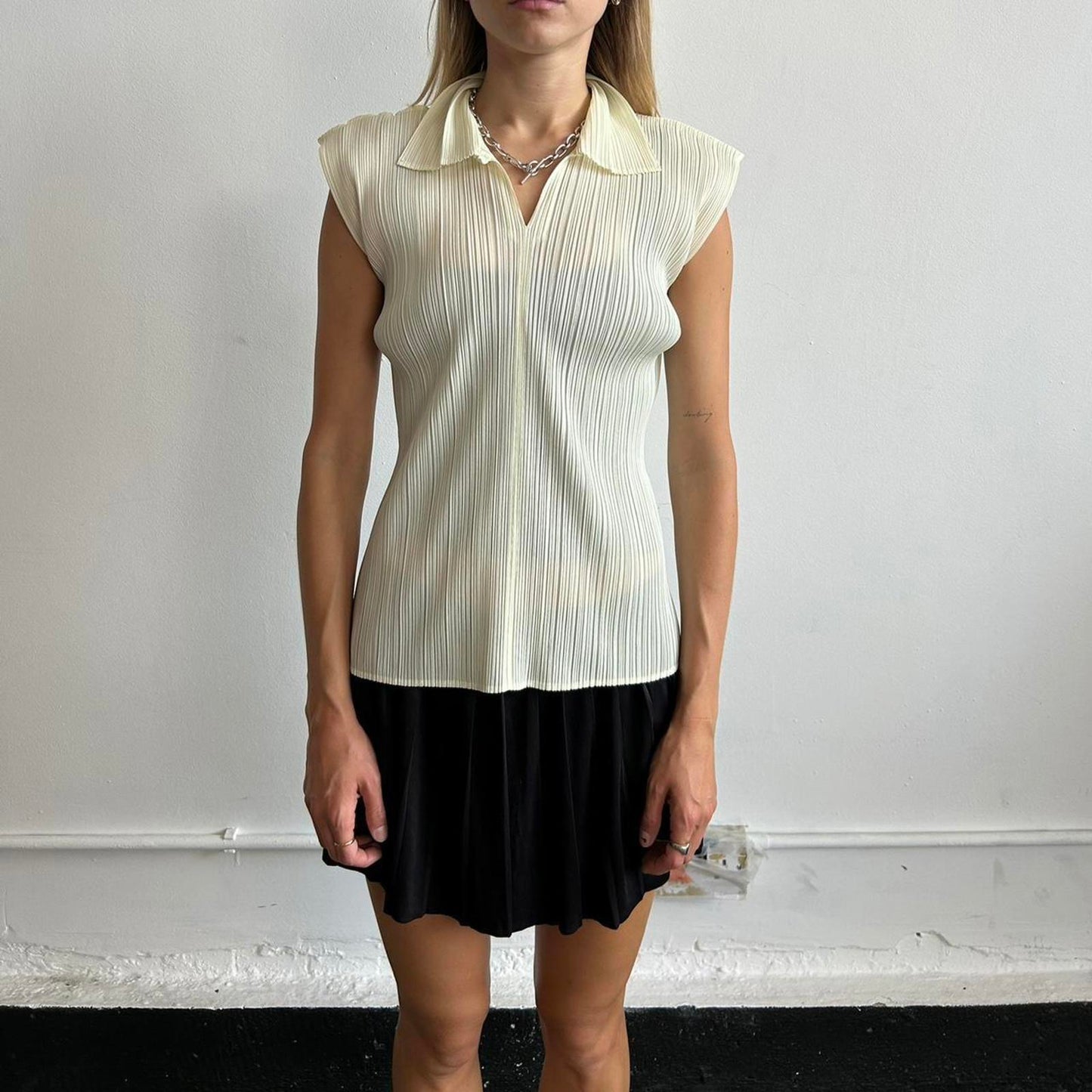Cream Issey Miyake Pleats Please sleeveless shirt