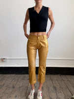 Comme Des Garçons gold trousers