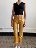 Comme Des Garçons gold trousers