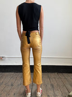 Comme Des Garçons gold trousers
