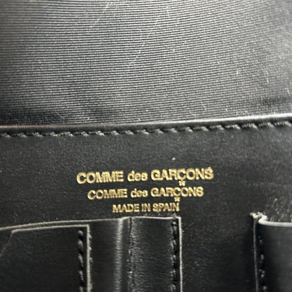 Comme Des garçons vinyl handbag