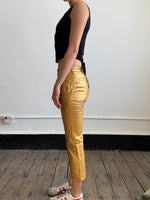 Comme Des Garçons gold trousers
