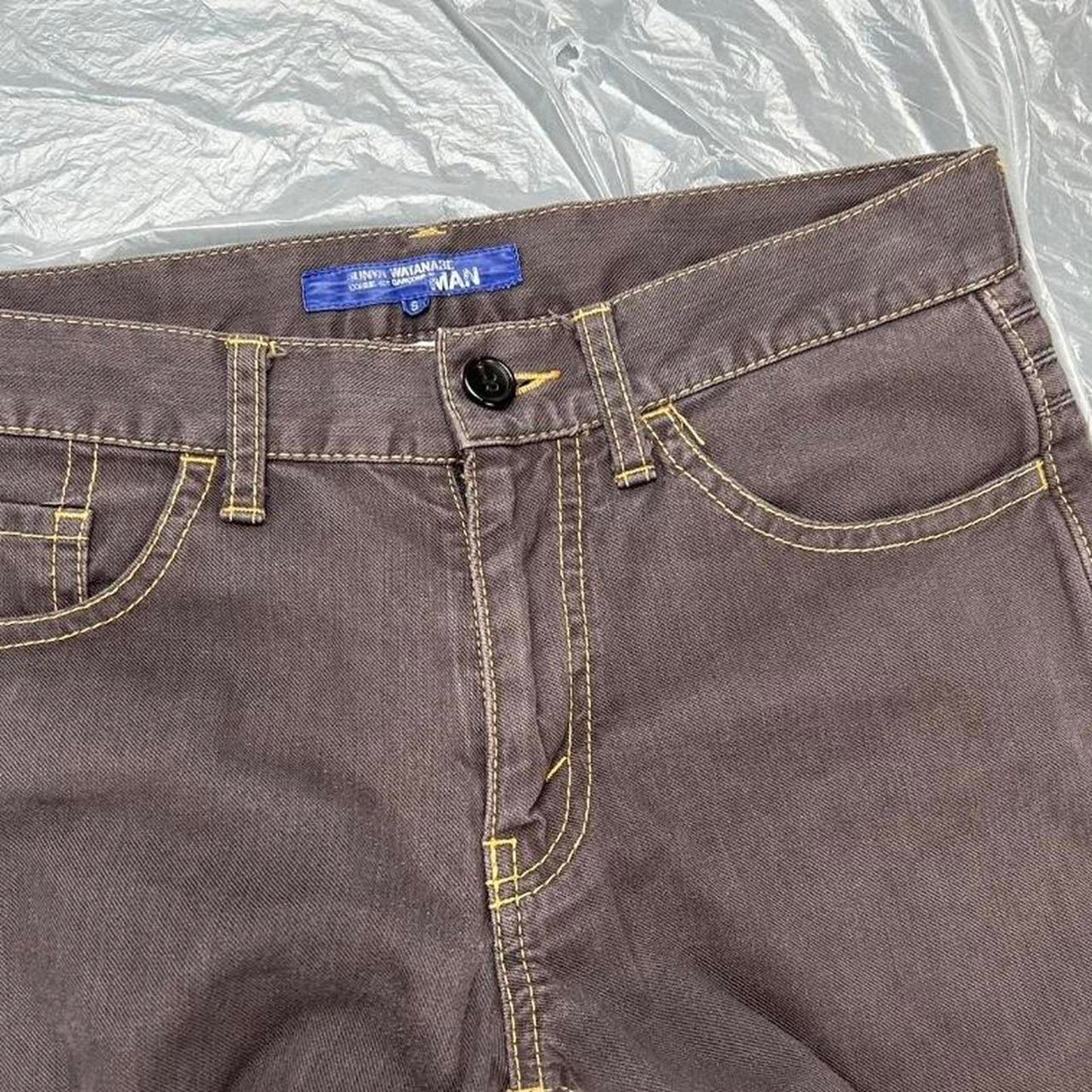 AD2004 Comme Des Garçons Man line trousers with knee crinkle details