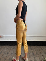 Comme Des Garçons gold trousers