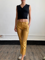 Comme Des Garçons gold trousers