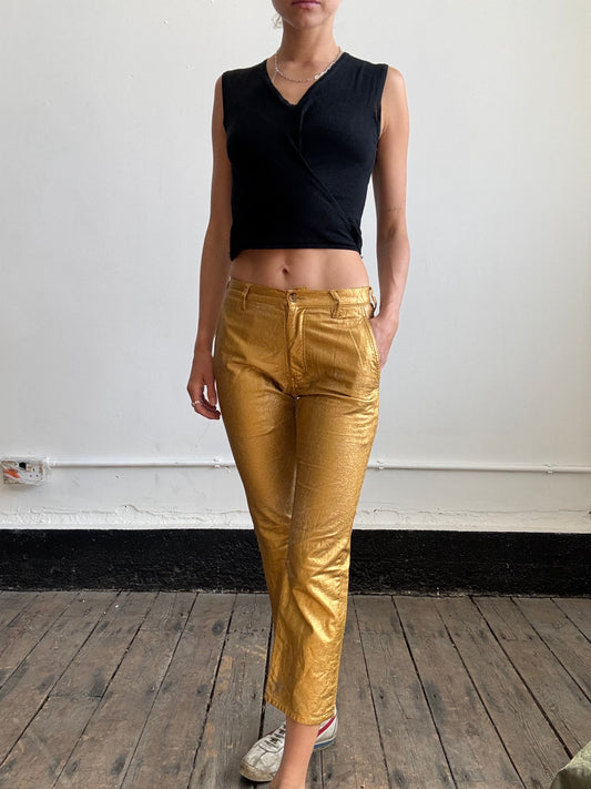 Comme Des Garçons gold trousers