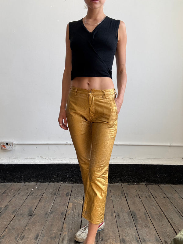 Comme Des Garçons gold trousers