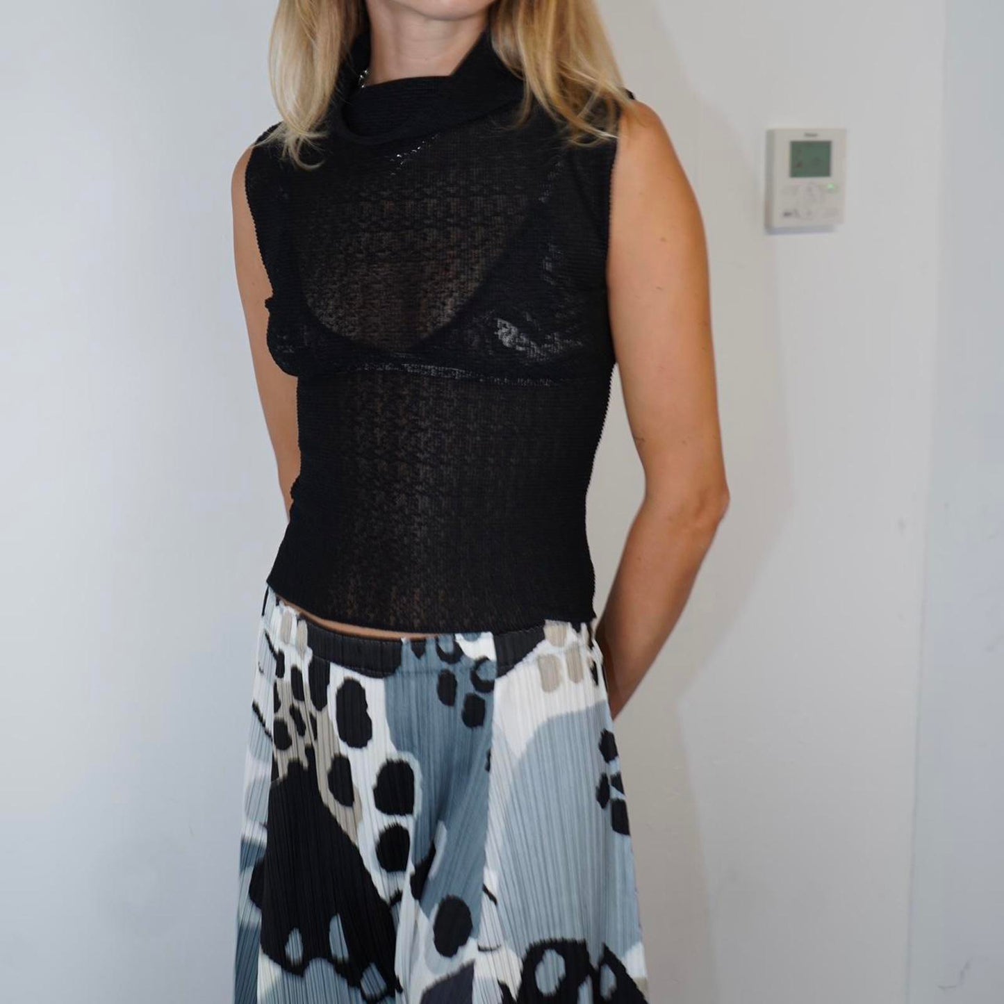 Issey Miyake roll neck sleeveless blouse